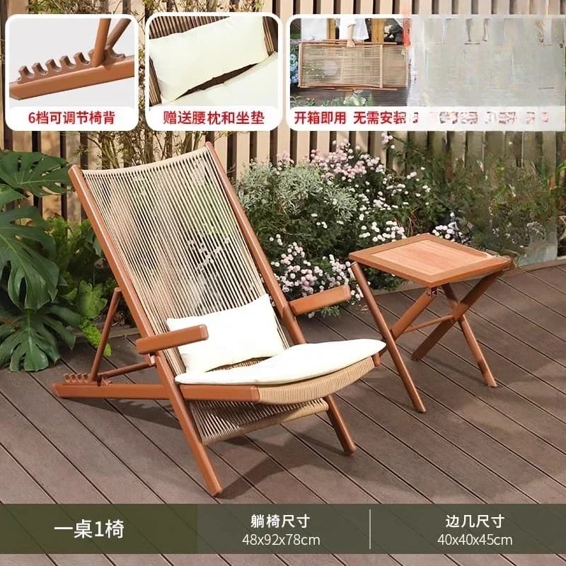 Modern brown folding lounge chair with white cushions and a matching wooden side table on a wooden deck.