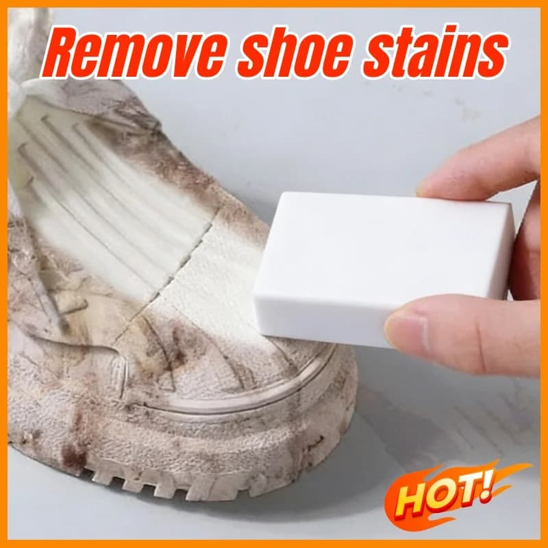 White sneaker cleaning eraser removing dirt from a dirty shoe.