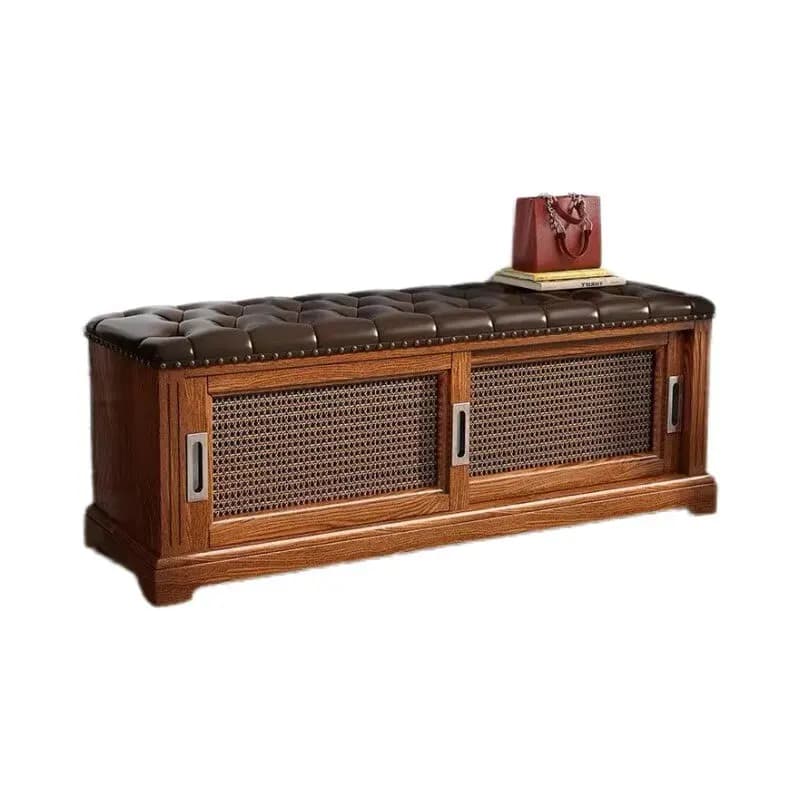 Elegant solid wood shoe changing stool with a dark leather tufted seat and sliding mesh cabinet doors.