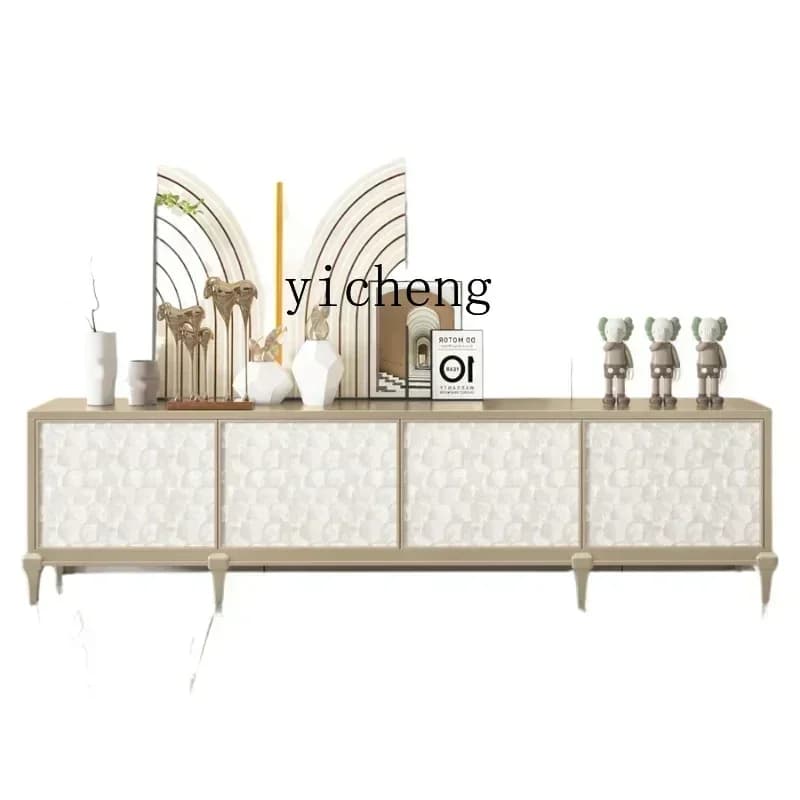 Modern cream-colored solid wood TV cabinet with textured door panels and minimalist legs.