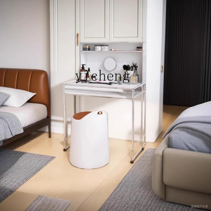 A sleek, chrome-framed modular makeup vanity and dresser in a modern bedroom setting.