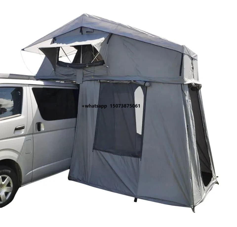 Grey waterproof folding car roof tent with an attached annex room setup on a silver van.