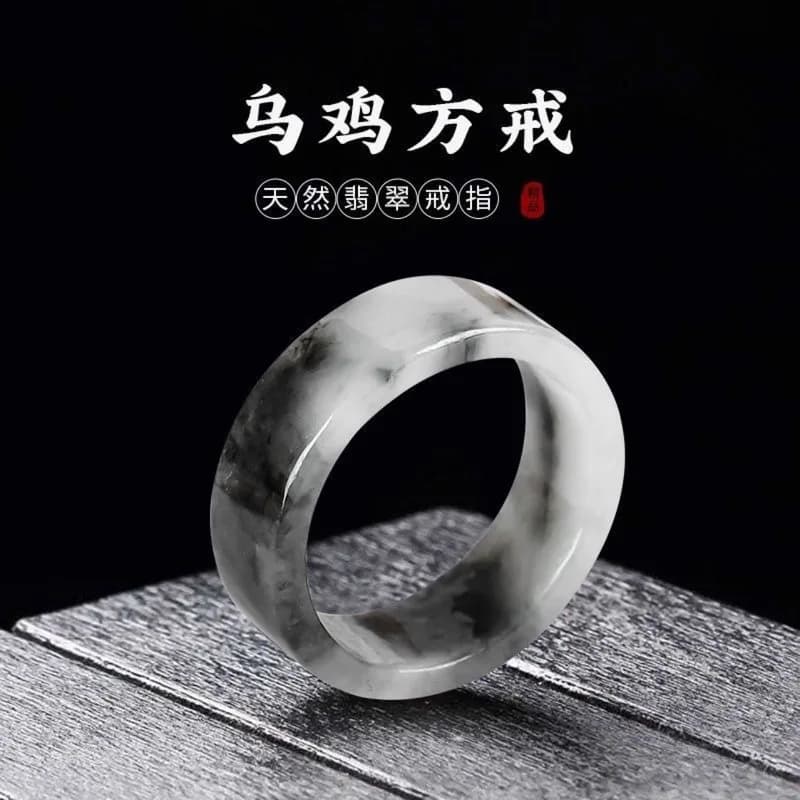 Polished natural Myanmar A-grade jade ring with unique black and white marbling.