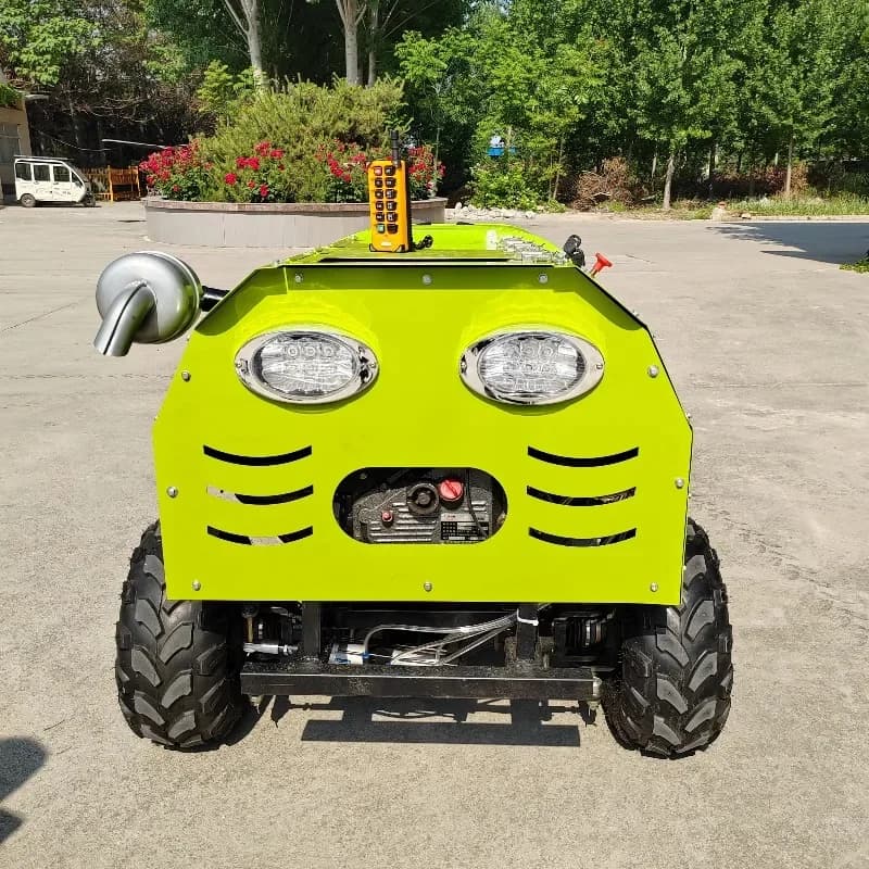 A bright green 4WD remote control farm sprayer vehicle with large tires and an integrated engine.