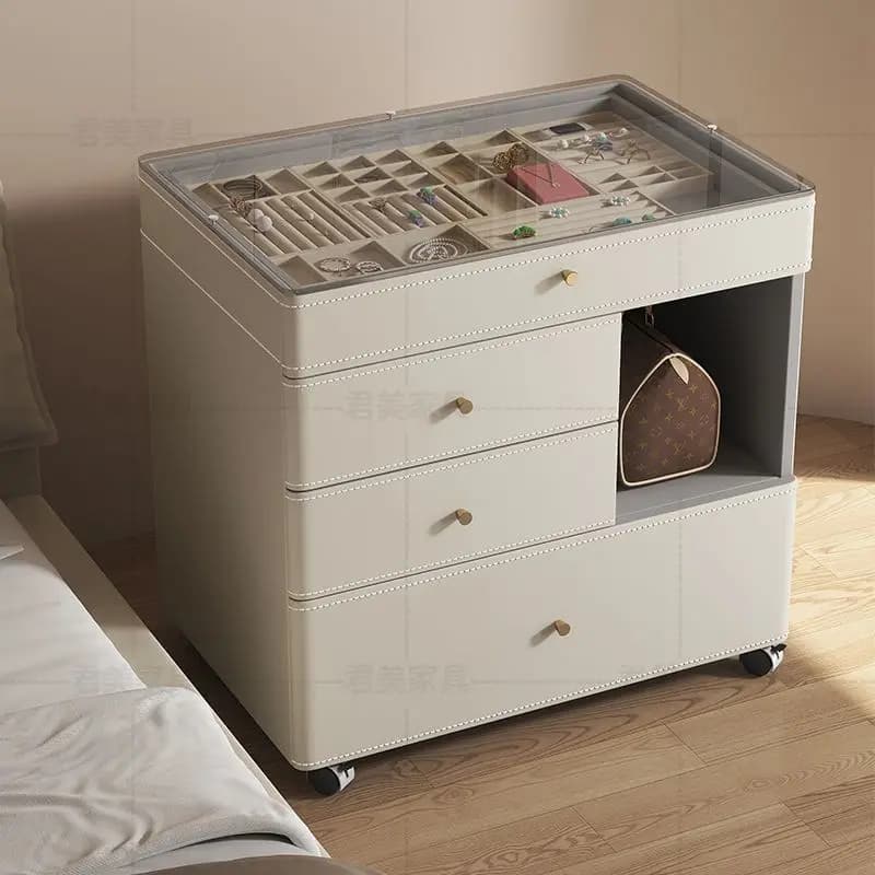 Modern white mobile jewelry chest with glass display top and storage drawers