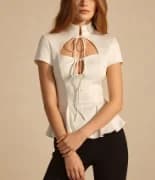 Elegant white blouse with high neck and front tie cutout detail