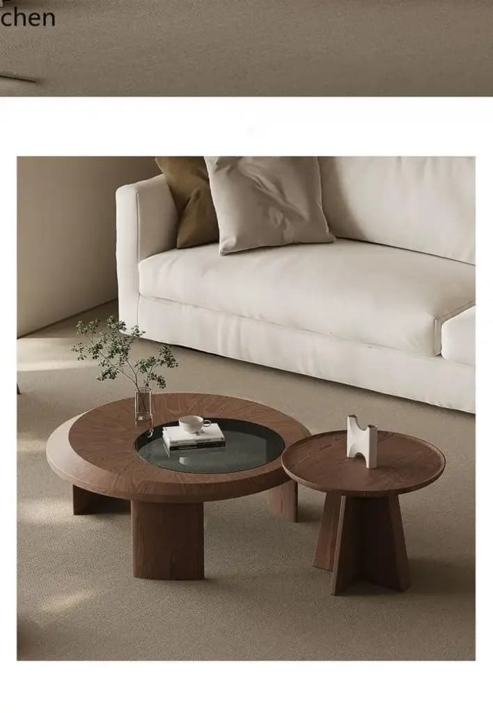 Modern round walnut tea table set with a unique New Chinese style aesthetic in a living room.