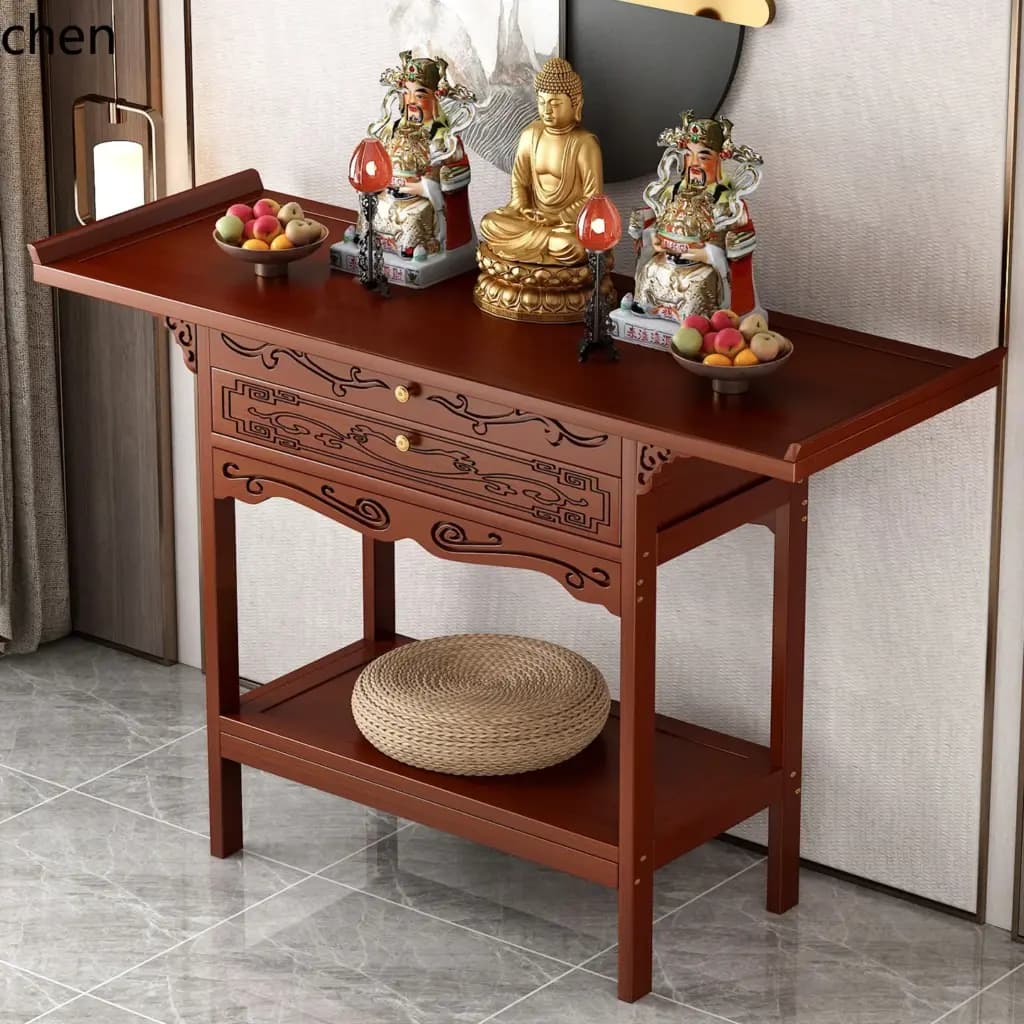 Traditional wooden standing altar table with Buddha statues and offerings.
