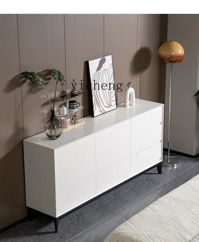 Modern white solid wood nine-drawer storage cabinet in a stylish living room setting