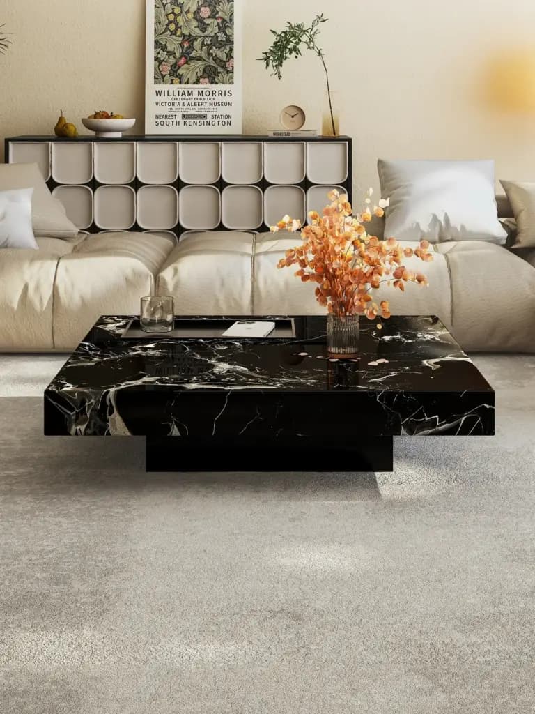 Modern black marble square coffee table with suspended base design in a minimalist room.