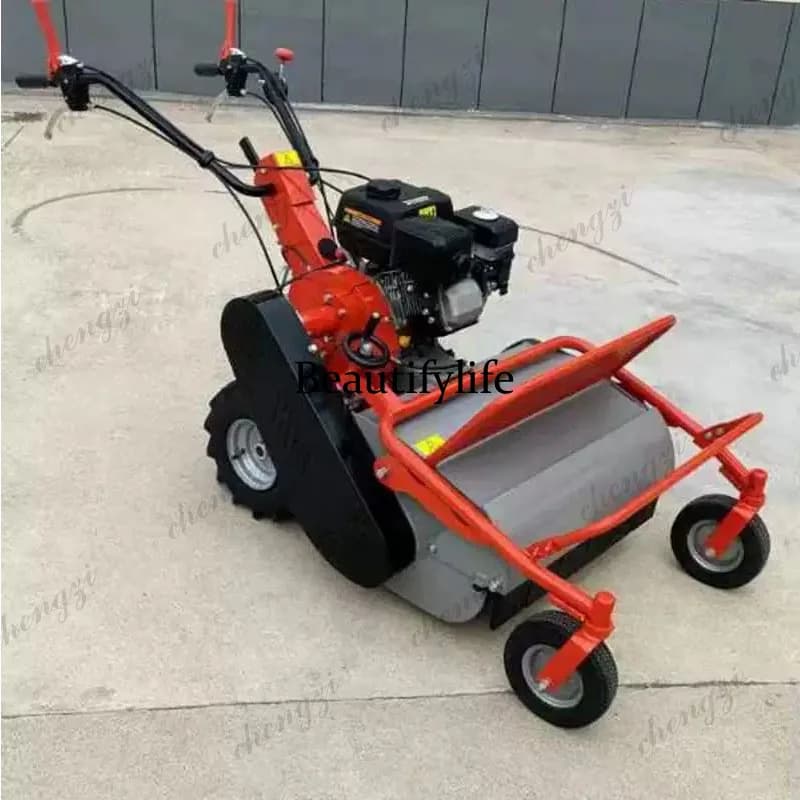 A heavy-duty red and grey self-propelled flail mower for agricultural use.