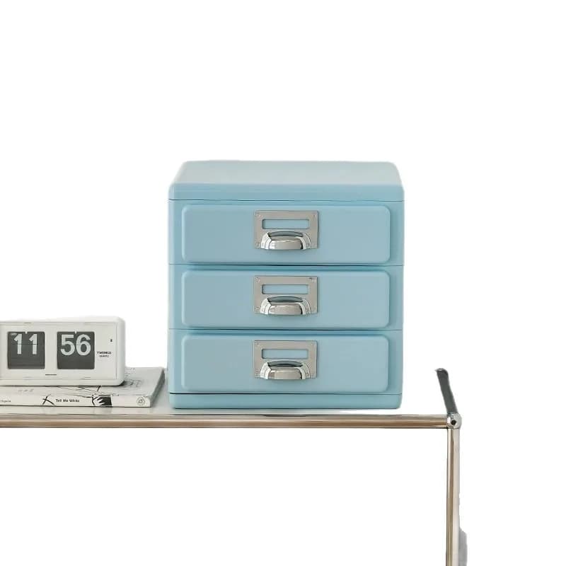 Light blue retro-style three-drawer desktop storage unit with metallic label handles.